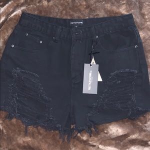black ripped jean shorts